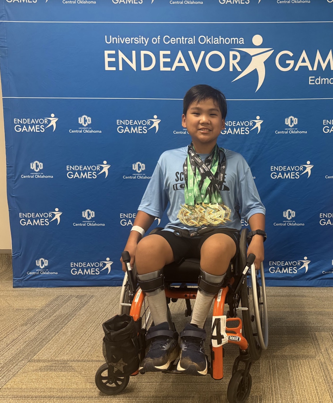 Ryle Feng at the Endeavor Games with his medals