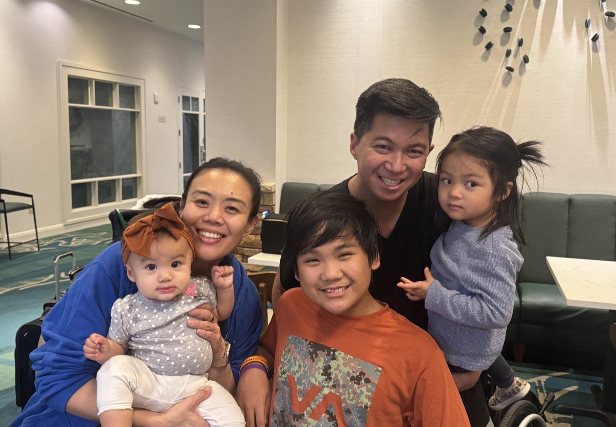 Ryle with Kidd's Kids community