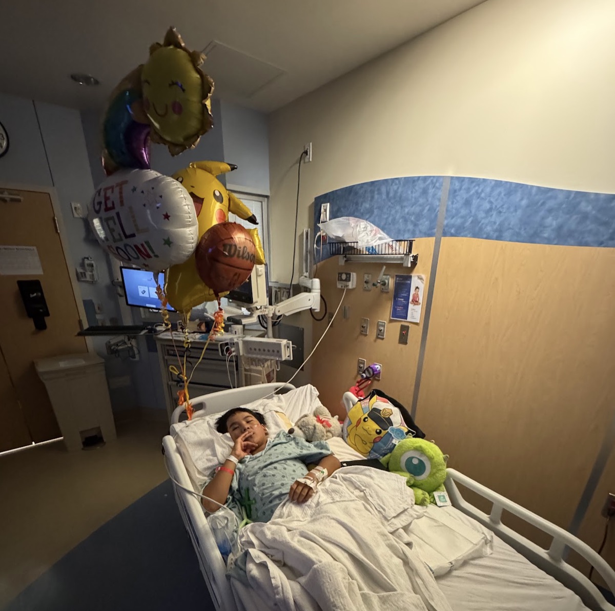 Ryle recovering in hospital bed after surgery