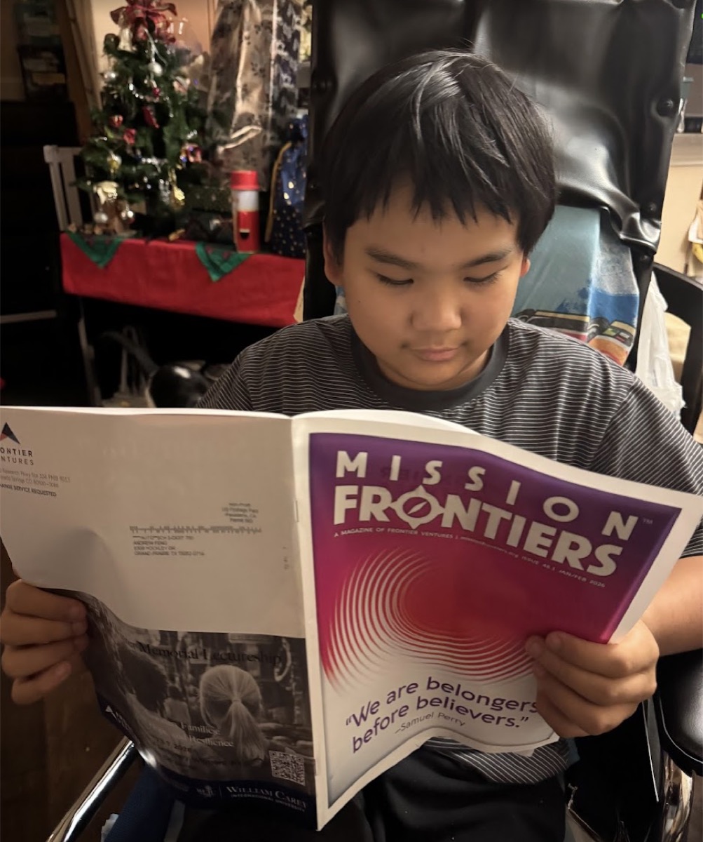 Ryle reading Mission Frontiers magazine